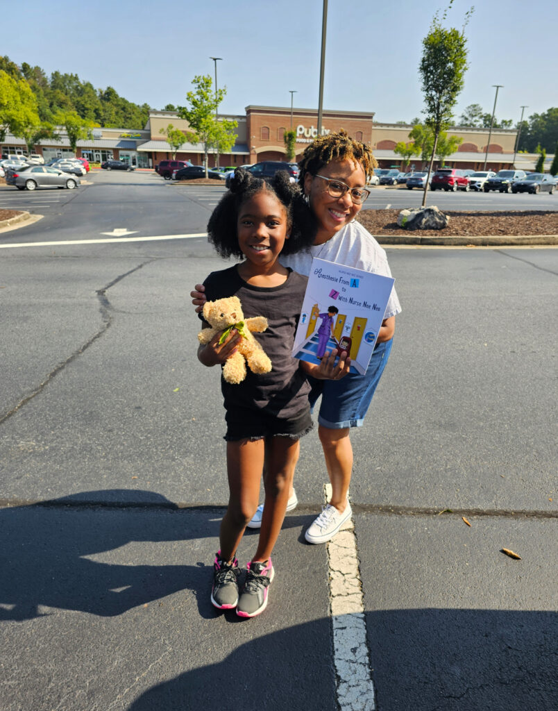 A woman posing for a picture with a kid holding a teddy bear